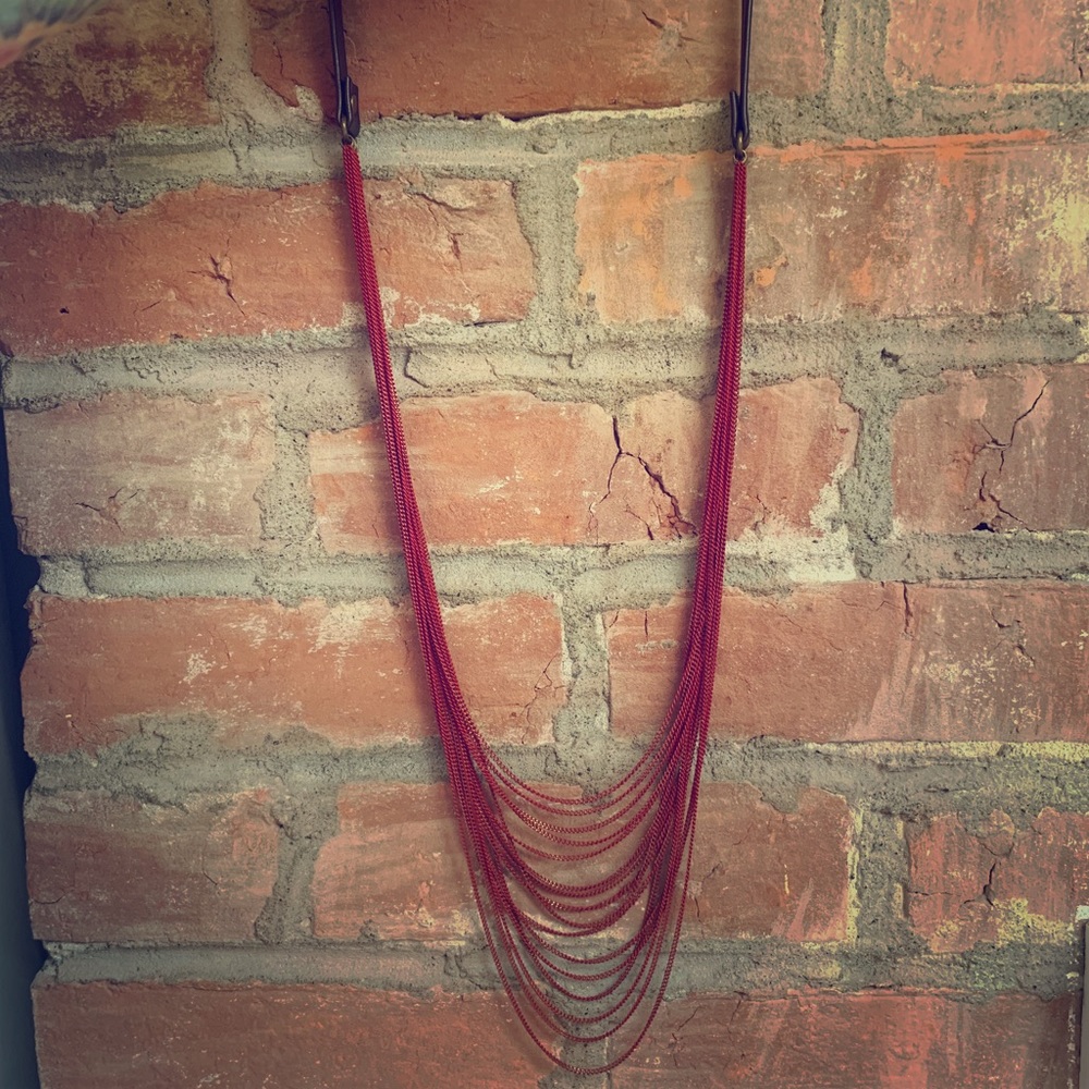 Beautiful faux leather and bead necklace.